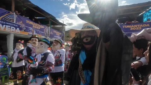 Slow motion video of folkloric dancers dancing the "Tunantada" Stock Footage 231133129