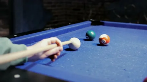 Slow motion video game of pool billiards. Hits the ball on the pool table Stock Footage 231233881