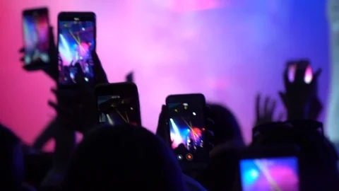 Slow Motion Video. Hands of man holding smartphones Video stock 114653923