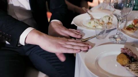 Slow motion video of hands of a man who quickly knocks his hands on table Stock Footage 231236551