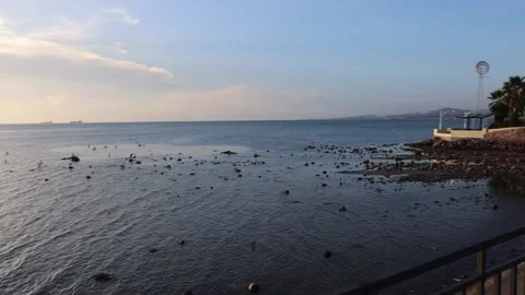 Slow Motion Video Of Malecon at La Paz, Mexico During a Sunset Walk. Video stock 166650423