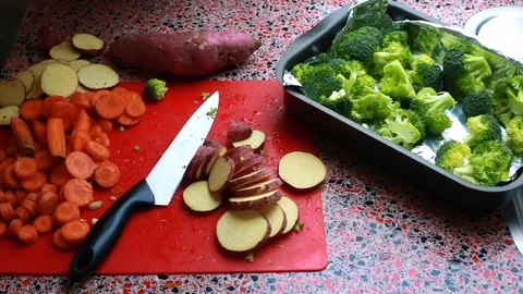 Slow motion video of man preparing vegan dish at home - 15 sec Stock Footage 126715419