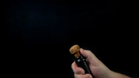 Slow motion video of man's hands opening black background Stock Footage 100516634