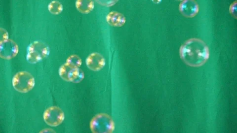 Slow motion video Many soap bubbles float on a green background, 스톡 동영상 108727930