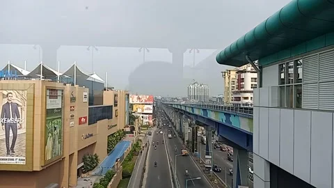 Slow motion video of moving traffic aerial view of a city road. Stock Footage 146938285