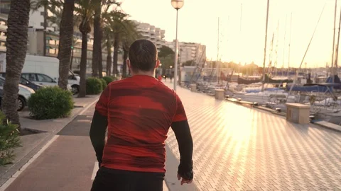 Slow motion video of new normal situation: a man in Spain wearing a protectio 스톡 동영상 129616130