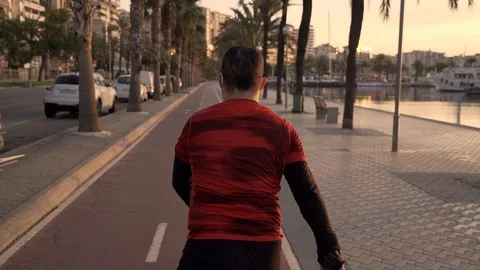 Slow motion video of new normal situation: a man in Spain wearing a protectio Video stock 129616150