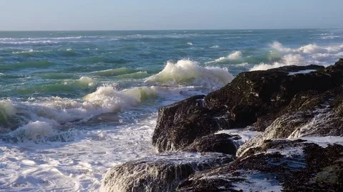 Slow motion video of ocean waves crushing rocky coast. Awesome power of waves Stock Footage 112122960