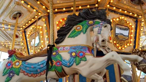 Slow motion video of a rolling carousel 스톡 동영상 144314902