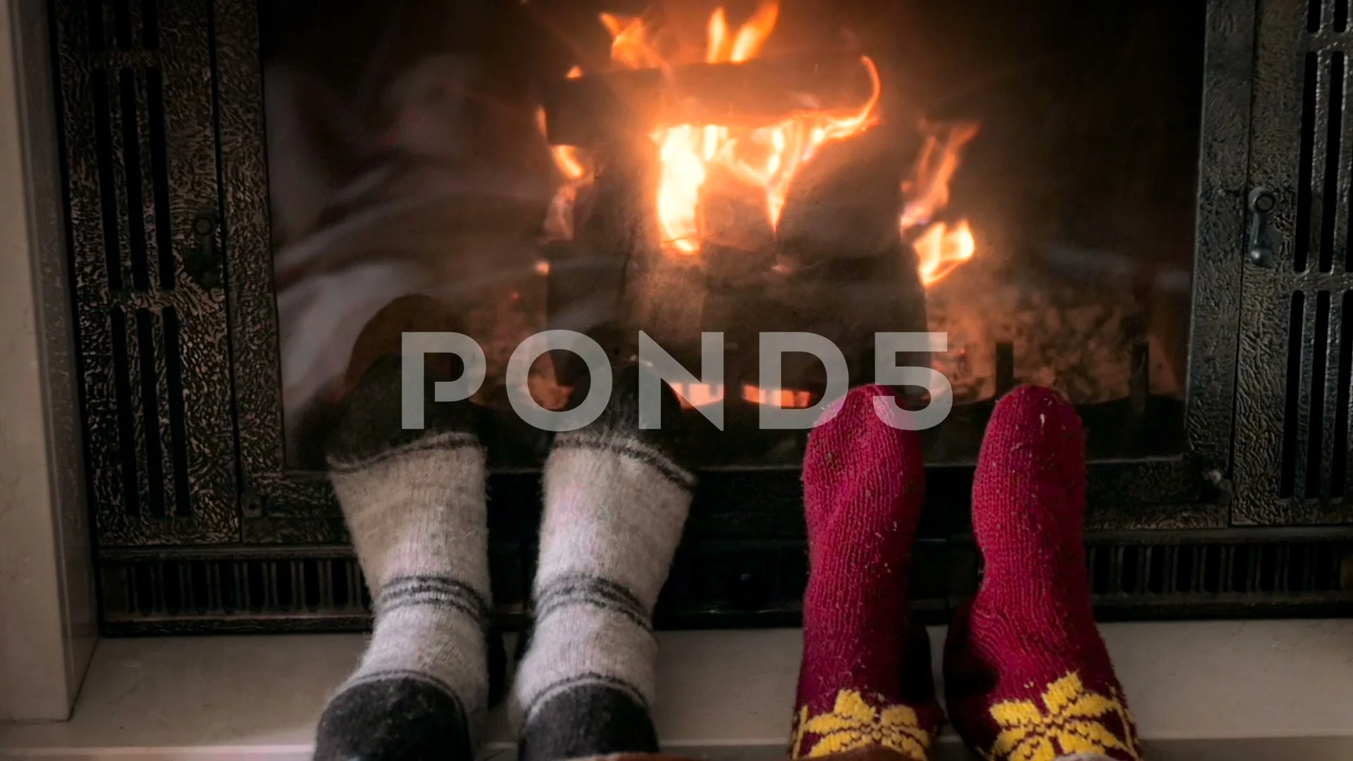 Slow Motion Video Of Romantic Couple Lying At Burning Fireplace