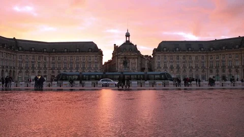 Slow motion video of a sunset on a square in Bordeaux, France Stock Footage