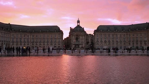 Slow motion video of a sunset on a square in Bordeaux, France Stock Footage 84038763