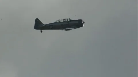 Slow motion video T-6 Texan in flight Stock Footage 82364383