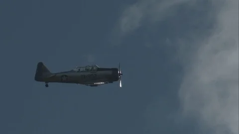 Slow motion video of T-6 Texan Trainer in Flight Stock Footage 82364398
