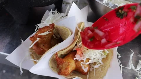 Slow Motion Video of a Taco Been Assembled with Ingredients. Stock Footage