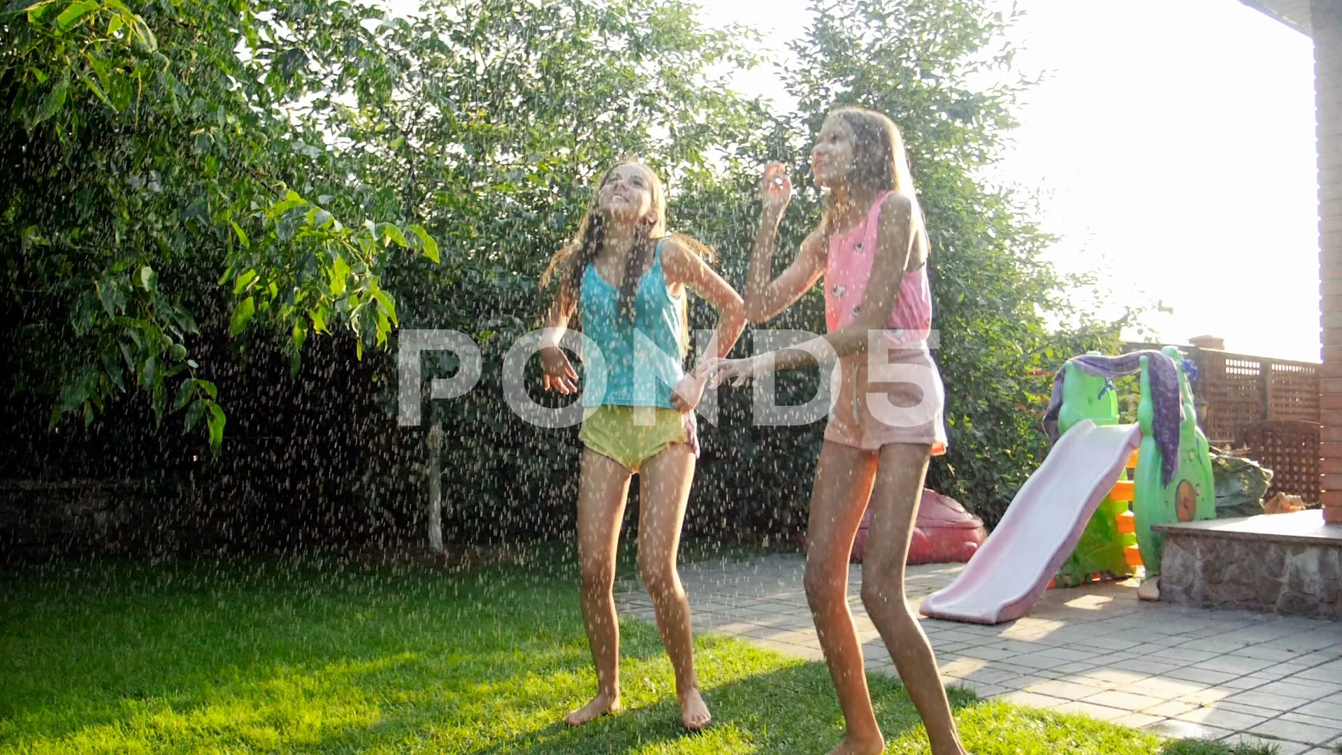 naked teen girls playing with the hose