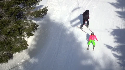 Slow motion video of two people skiing Stock-Footage 88434645