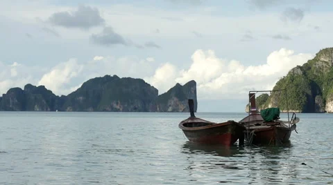 Slow motion video with two small fisher boats near Phi Phi island, Krabi, Stock Footage 59775141