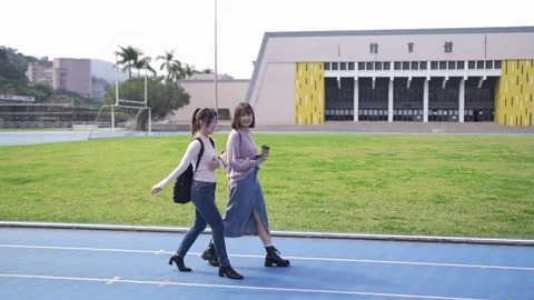 A slow-motion video of two young Taiwanese women Stock Footage 279288934