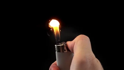 Slow Motion Video of Using a Lighter at Night with Sparkles and Fire Stock-Footage 82279816