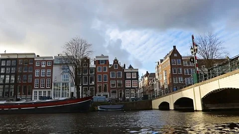 Slow motion video of view from the canal to the streets. Stock Footage 71354945