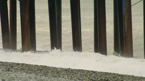 Slow motion video. View of the pier from the side of the sea Stock Footage 221291841