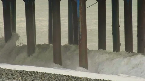 Slow motion video. View of the pier from the side of the sea Stock Footage 221300614