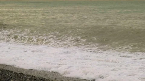 Slow motion video. View of the sea waves that break on the shore. Stock Footage 221301031