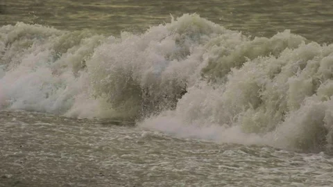 Slow motion video. View of the sea waves that break on the shore. Stock Footage 221302176
