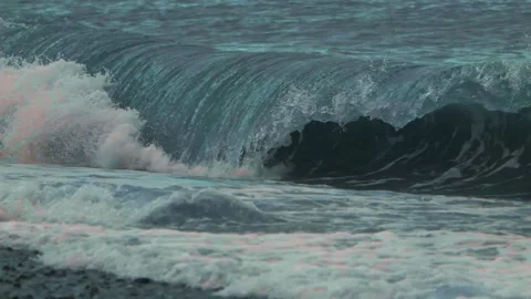 Slow motion video. View of the sea waves that break on the shore. Stock Footage 221304459