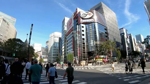 Slow motion video of walking along Ginza crosswalk Sukiyabashi, Tokyo. Stock Footage 157796375