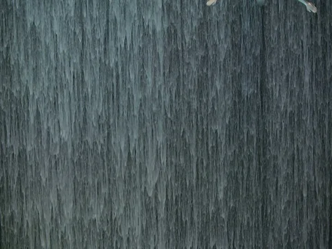 Slow motion video of Waterfall inside of the Dubai Mall. Stock Footage 73608782