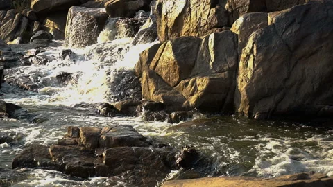 Slow motion video of waterfall in the mountains at evening	 Stock Footage 143973230