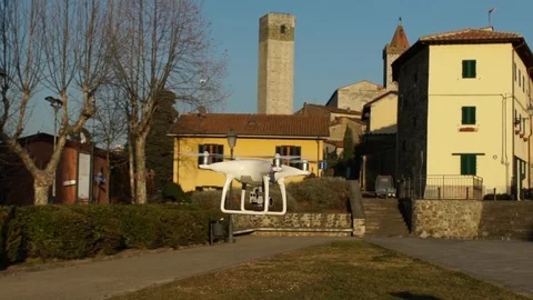 Slow motion video of a white quadcopter drone hovering. Vidéo 71978053