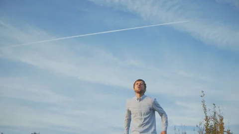 Slow motion video of a young man jumping mid-air Stock Footage 99837067
