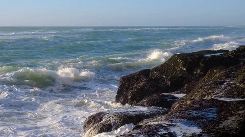 Slow motion vidoe of ocean wave crushing rocky coast. Awesome power of waves  Stock Footage 108097036
