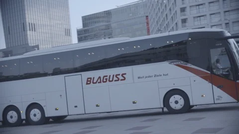 Slow motion view of bus pulling in, Vienna, Austria Stock Footage 98763870