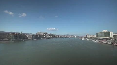 Slow Motion View of Danube River Waterfront and Traffic in Budapest Stock Footage 336064801