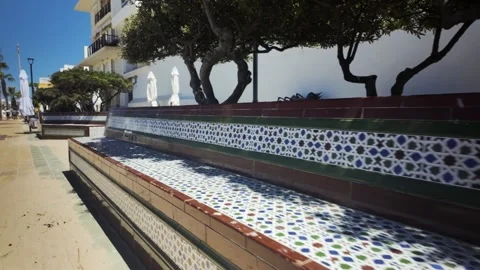 Slow motion view of a decorative tile bench, Rota, Andalucia, Spain Stock Footage 346281995