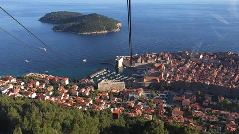 Slow motion view of a descending cable car towards Dubrovnik town, Croatia, 4k Video stock 276365109
