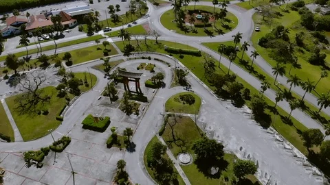 Slow Motion View of East Mall Roundabout Traffic in Freeport, Grand Bahama Stock Footage 106786590