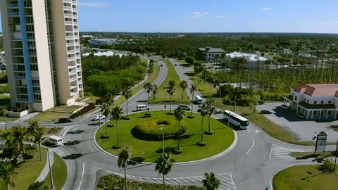 Slow Motion View of East Mall Roundabout Traffic in Freeport, Grand Bahama Stock Footage 106786712