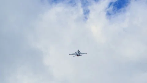 Slow motion view of F-18 fighter jets performs a vertical climb into t Stock Footage 326857323