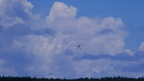 Slow motion view of a float plane landing near Le Morne in Mauritius Stock Footage 170072544