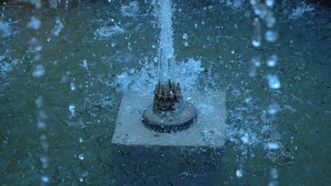 Slow Motion View of Flowing Water in Fountain Stock Footage 313567032