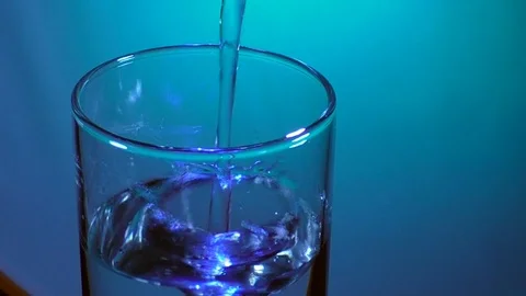 Slow motion view on glass of clear water Stock Footage 93255141