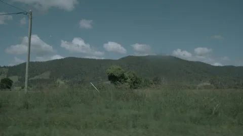 Slow Motion View of Green Hills and Fields in Sunshine Coast Hinterland, Queensl Stock Footage 341297703