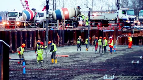 Slow motion view of group of construction workers wearing PPE safety gear Vídeos de archivo 325776771