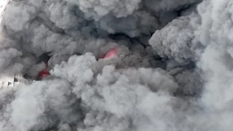 Slow motion view Large cloud of smoke is billowing from a fire Stock-Footage 332227922