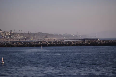 Slow Motion View of Marina Del Rey Inlet and Playa Del Rey Beach Stock Footage 299936695